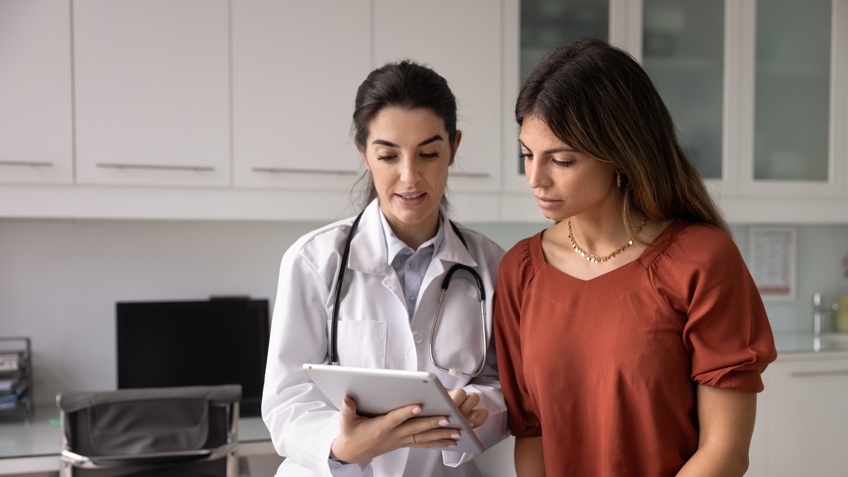Doctor reviewing semaglutide side effects with a patient during a consultation